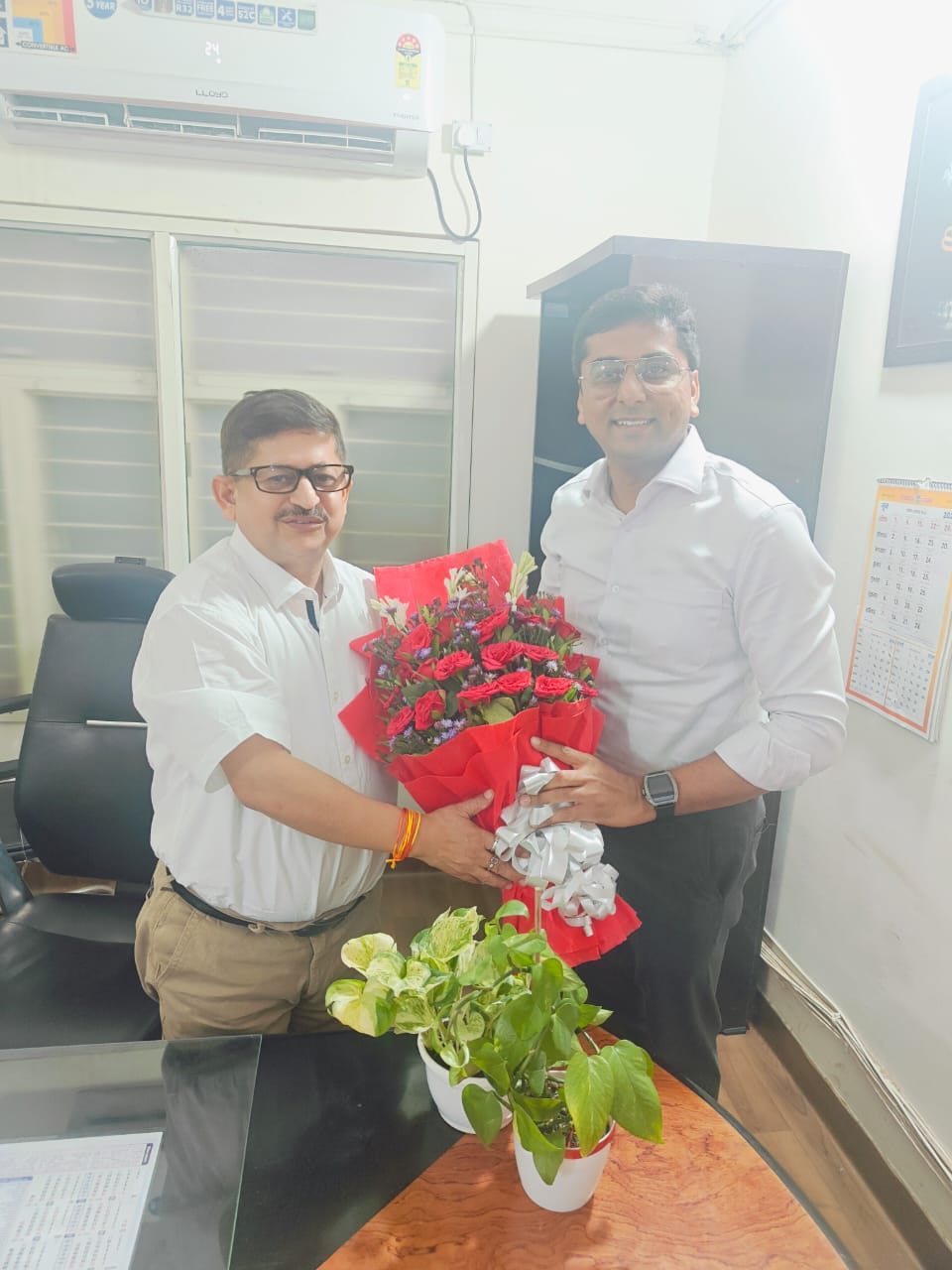 Dr. Zeeshan Ahmed with Shri Manish Sharma ji CMHO Dr. Zeeshan Ahmed with Shri Manish Sharma ji CMHO